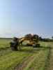 John Deere 653E with Fabtek 4 Roller Harvesting Head