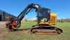 CAT 501HD with Fabtek 4 Roller Processing Head