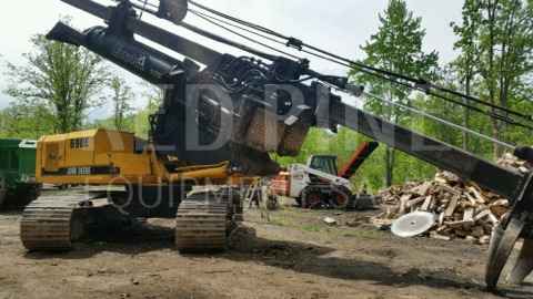 John Deere 690E with a Lim-mit 2000B Delimber ***SOLD***